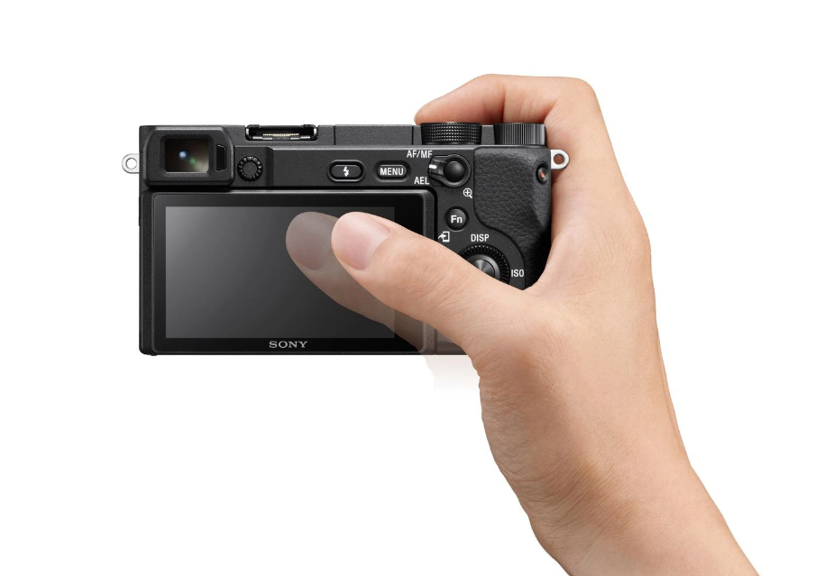Appareil photo hybride Sony Pack A6400 + FE 16-50 mm + FE 55-210 mm + chargeur externe + 2ème batterie